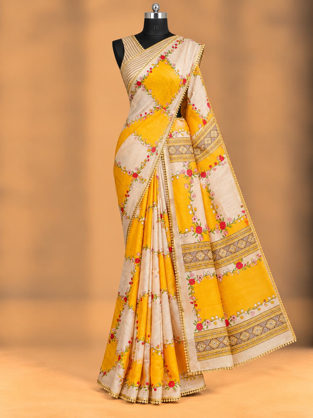 Sand Beige With Orangish Yellow - Anjali - Soft Tissue Linen Saree With Floral Print & Lace Border