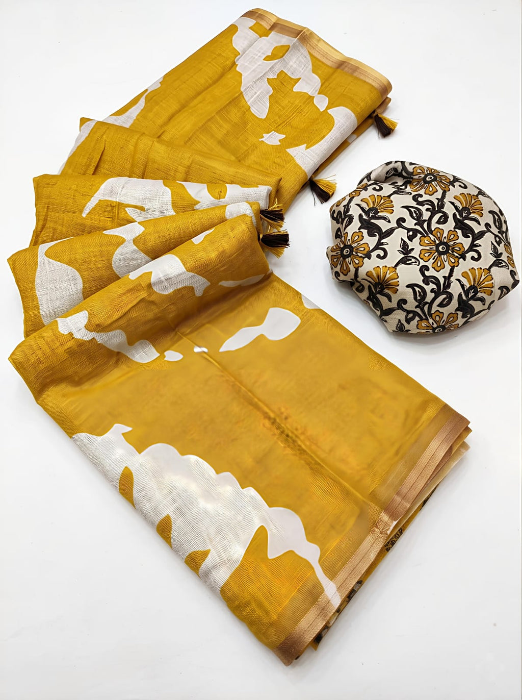 Premium linen metallic cotton saree featuring an intricate geometric medallion pattern.